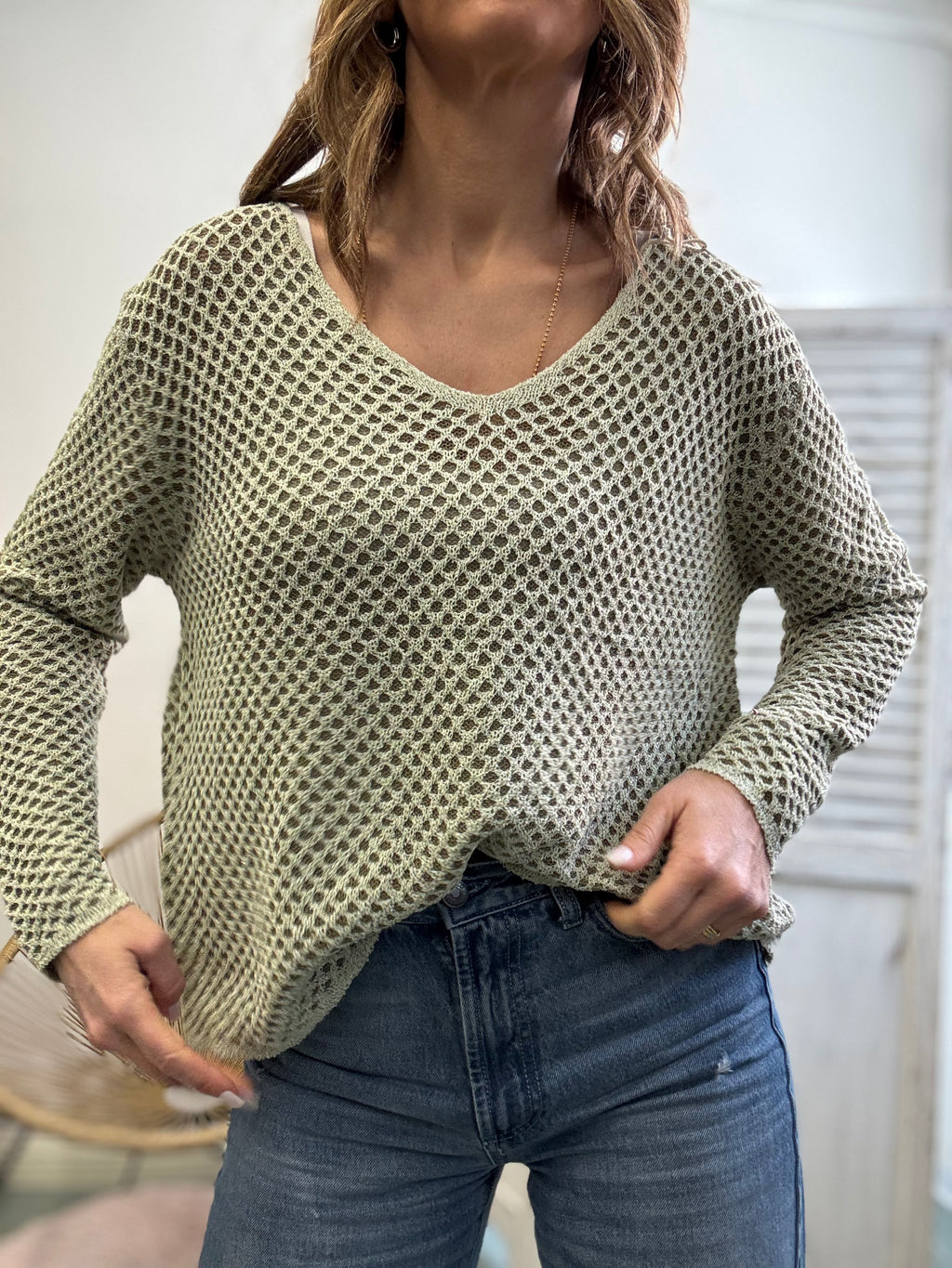 Il maglioncino a V a nido d’ape