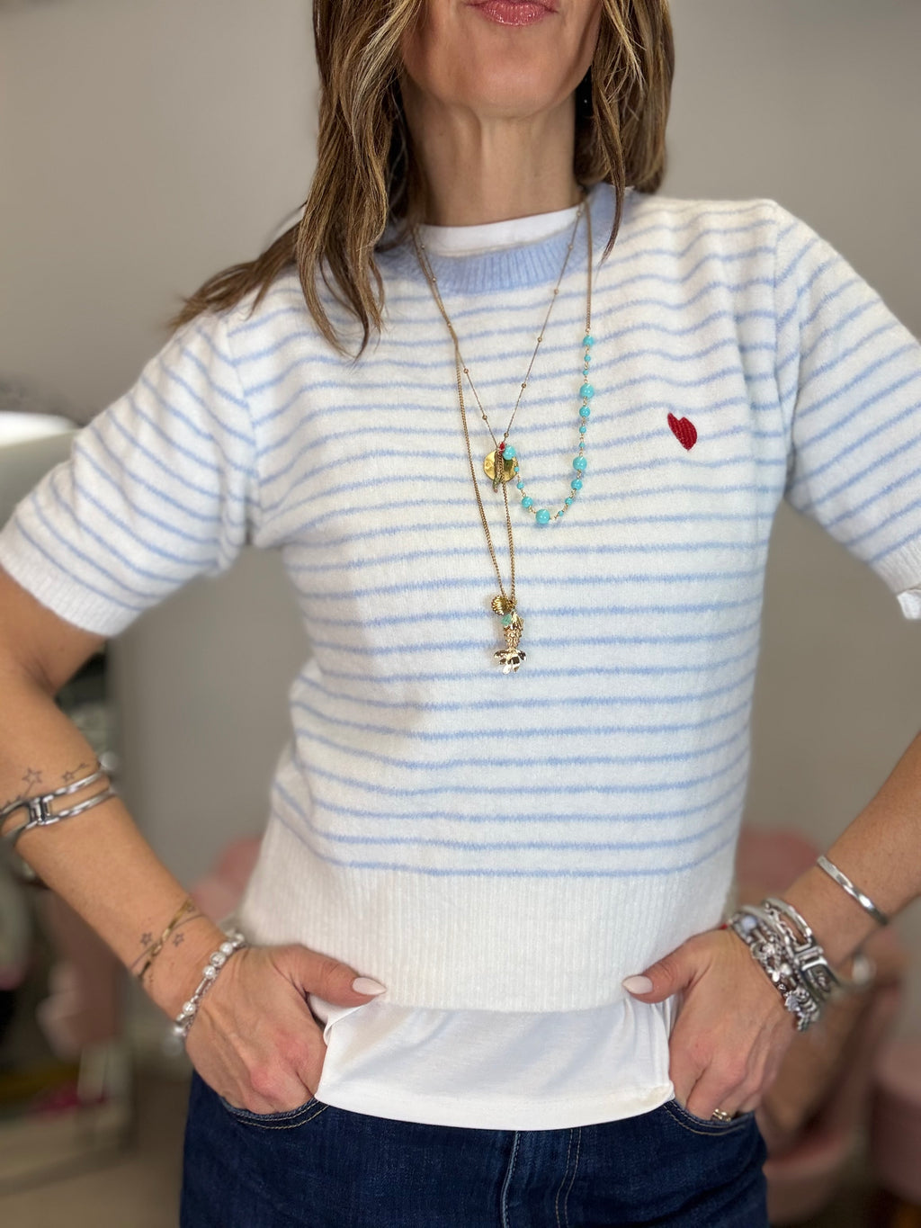 Il pull cuoricino e righine pastello