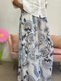 Il pantalone in lino coi fiori blu