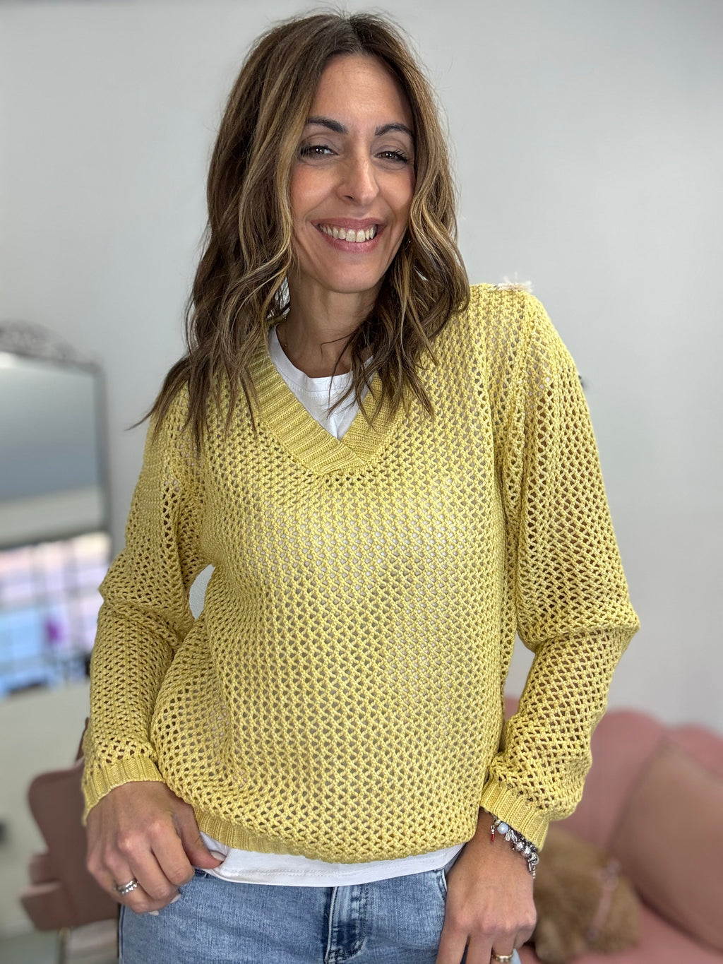 Il pull uncinetto scollo V