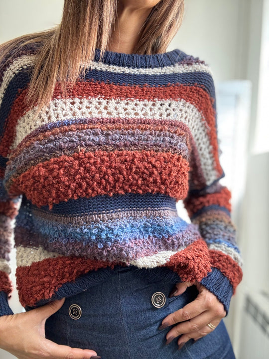 Il Pull bicolore boucle