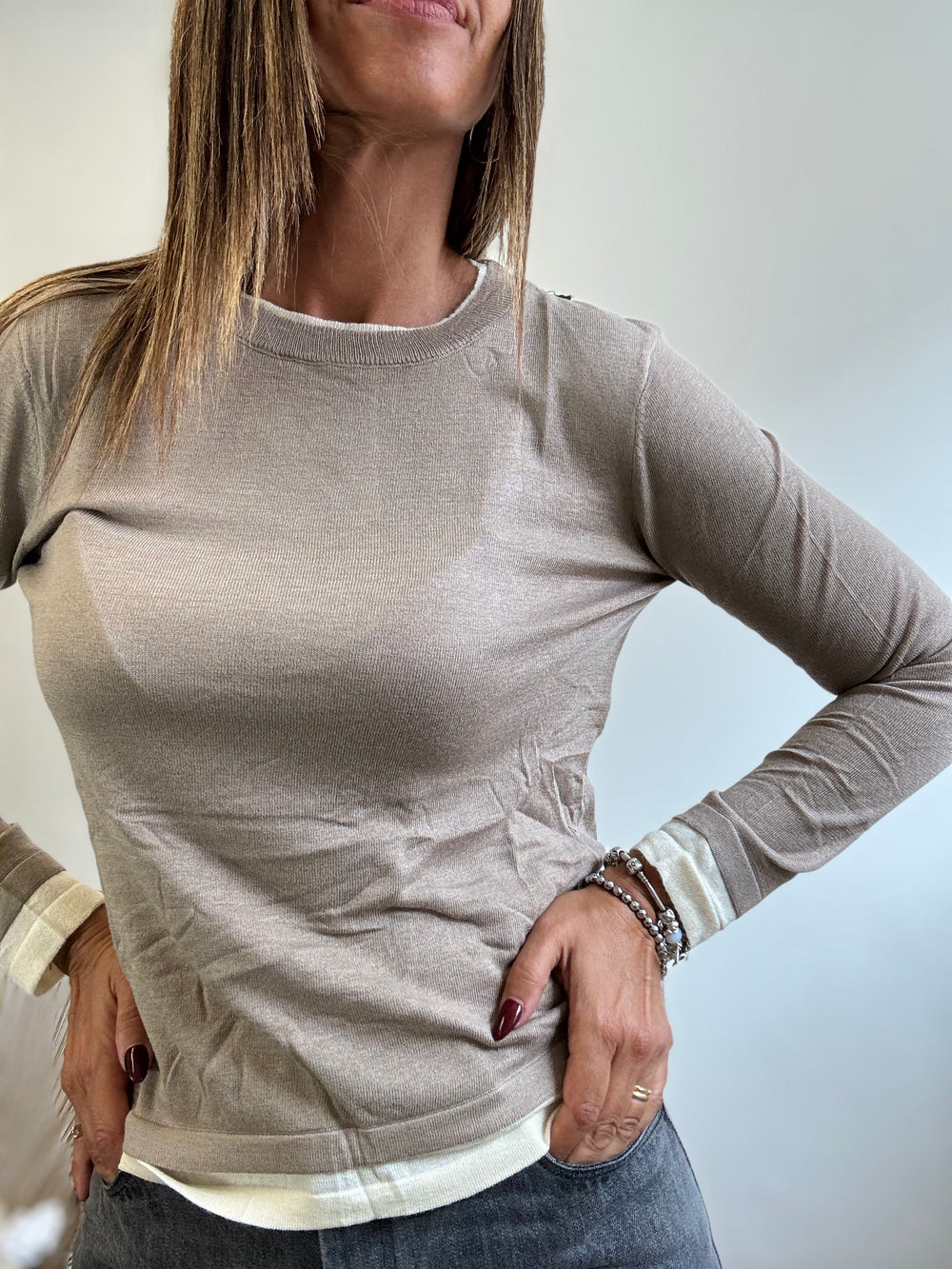 Il pull leggero sovrapposto