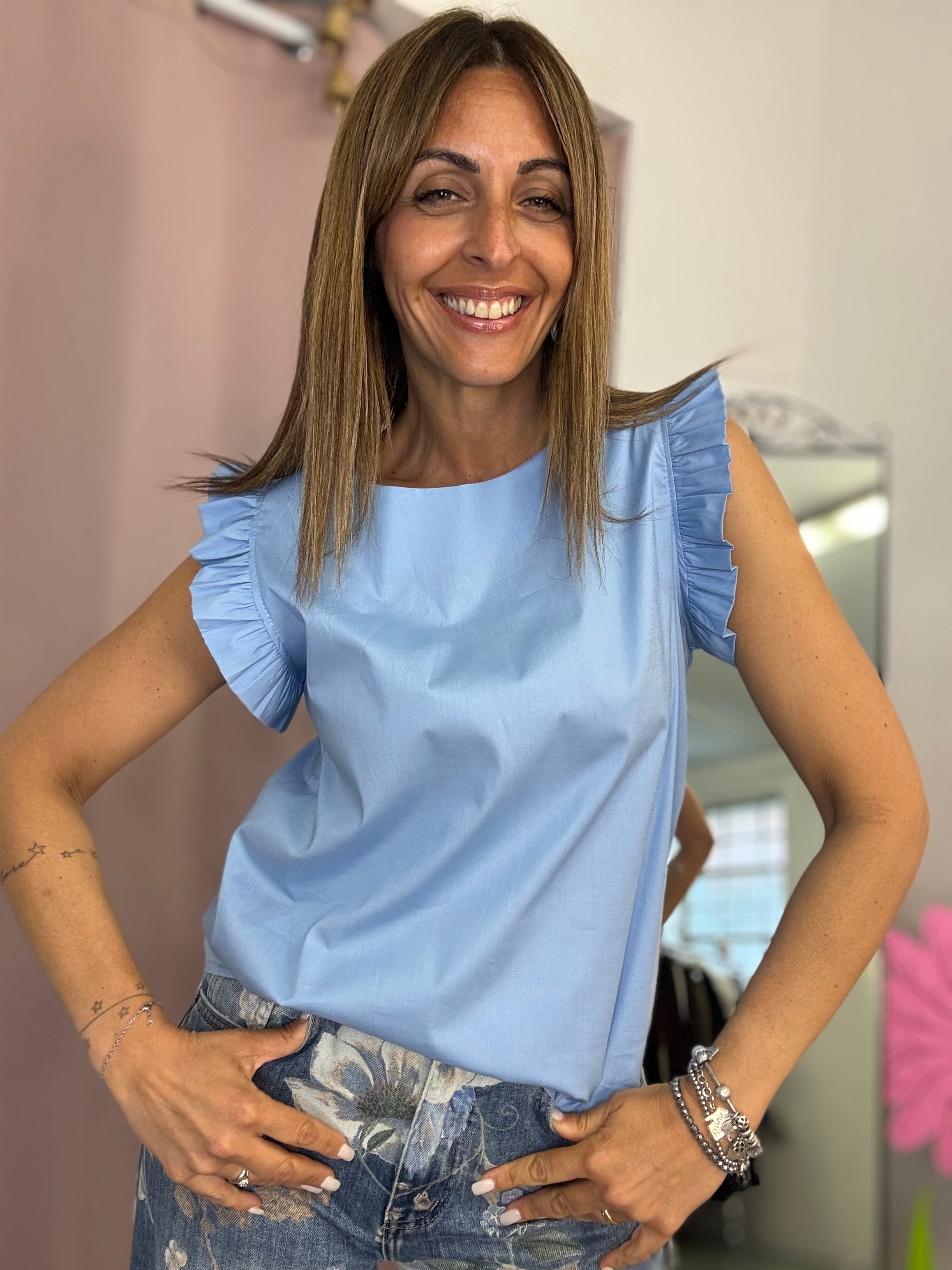 La blusa con le maniche fru fru