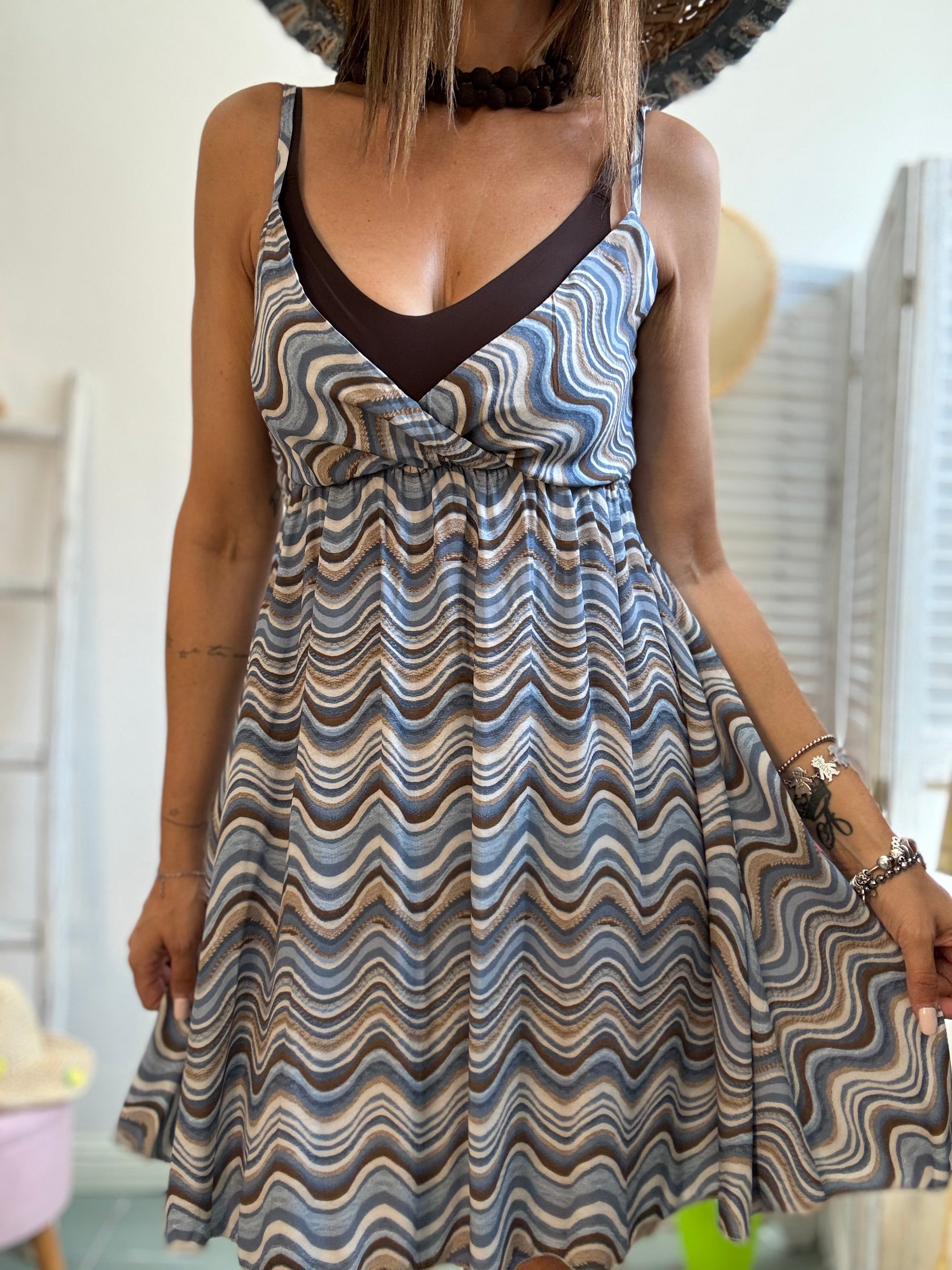 Abito con le ondine cortine