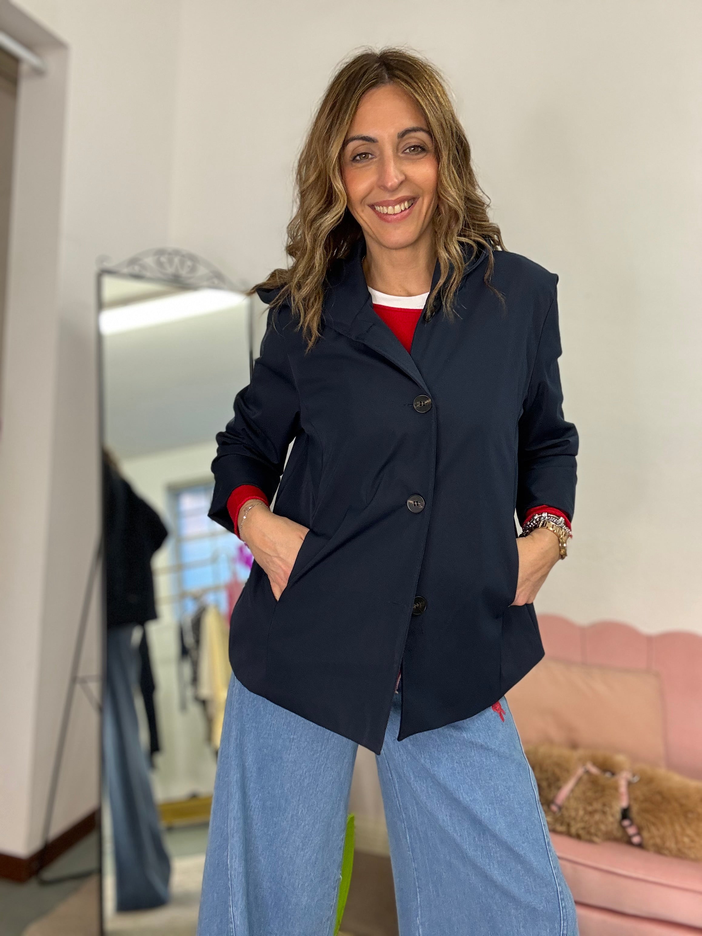 Lo spolverino col cappuccio