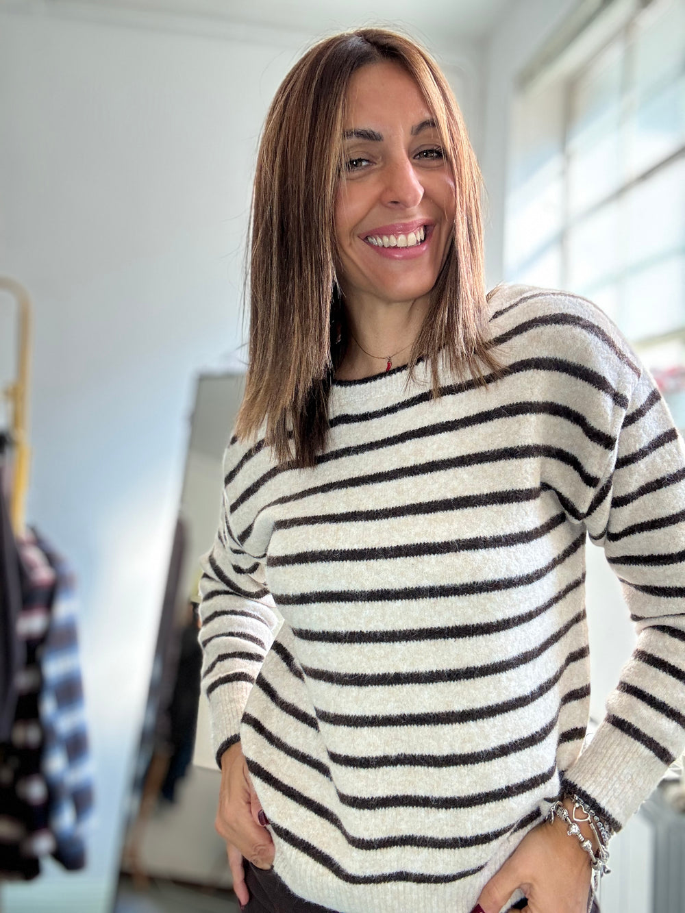 Pull fiocchetti rigato