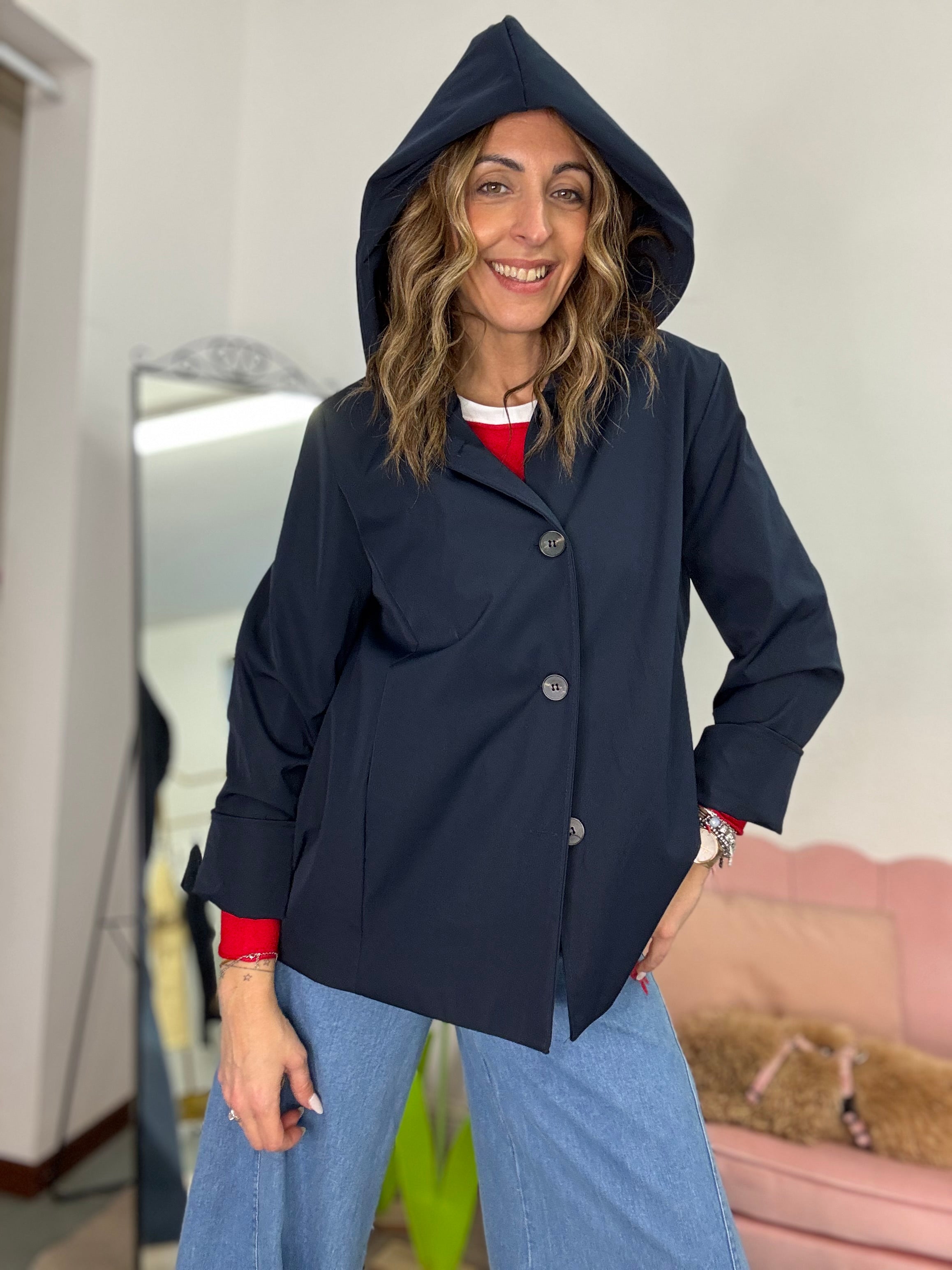 Lo spolverino col cappuccio