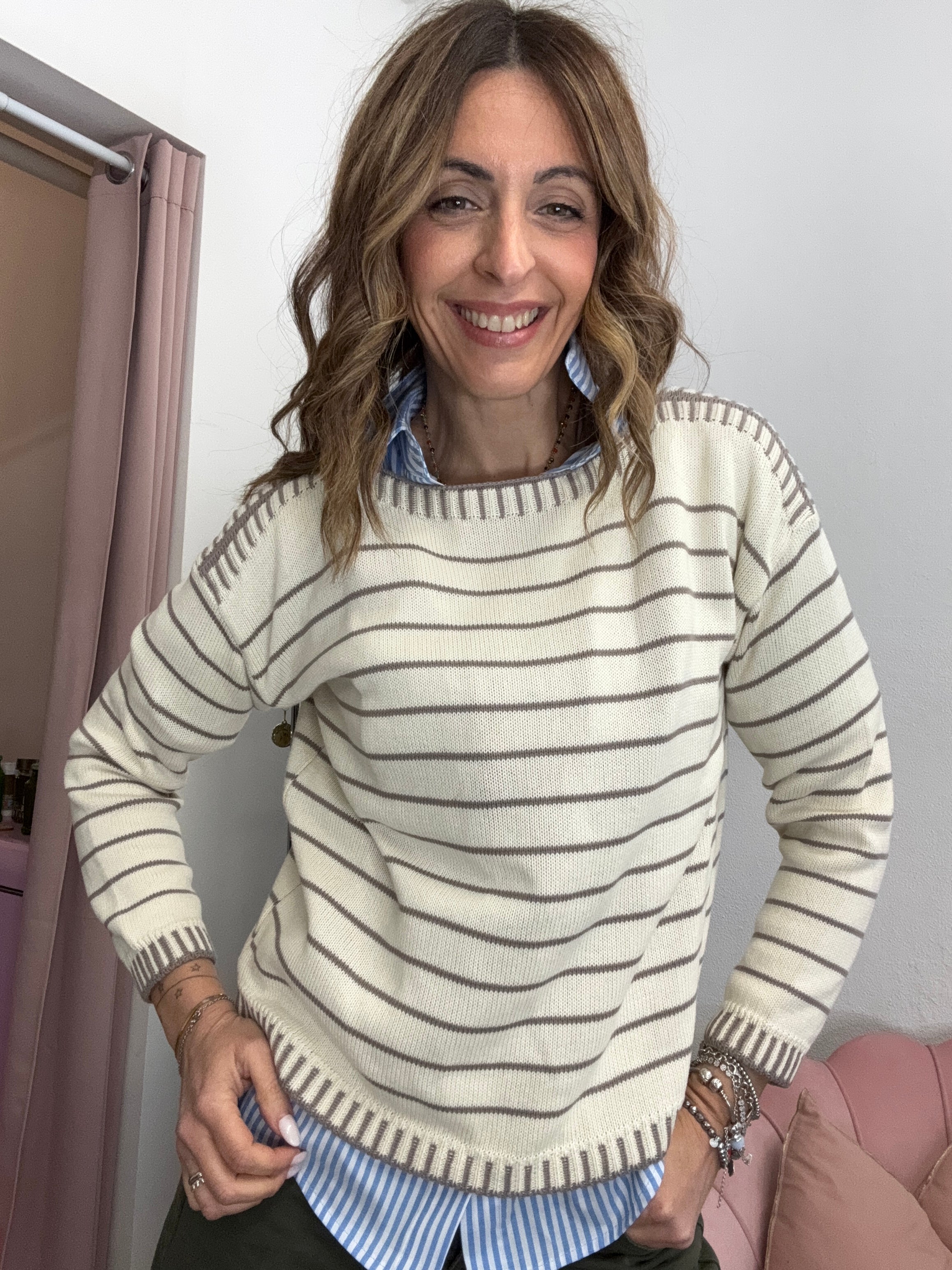 Il pull cotone con le impunture