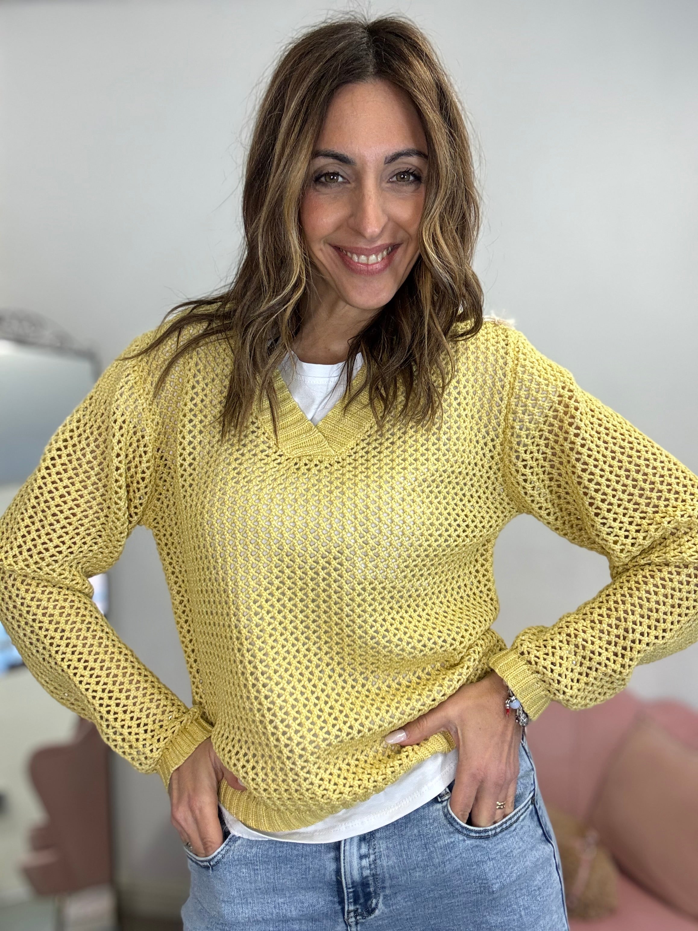 Il pull uncinetto scollo V