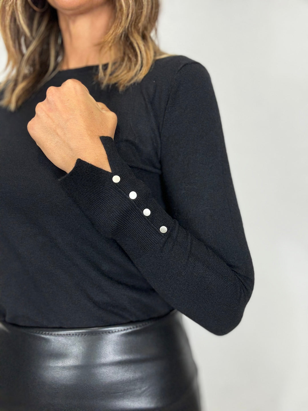 Il pull coi bottoncini