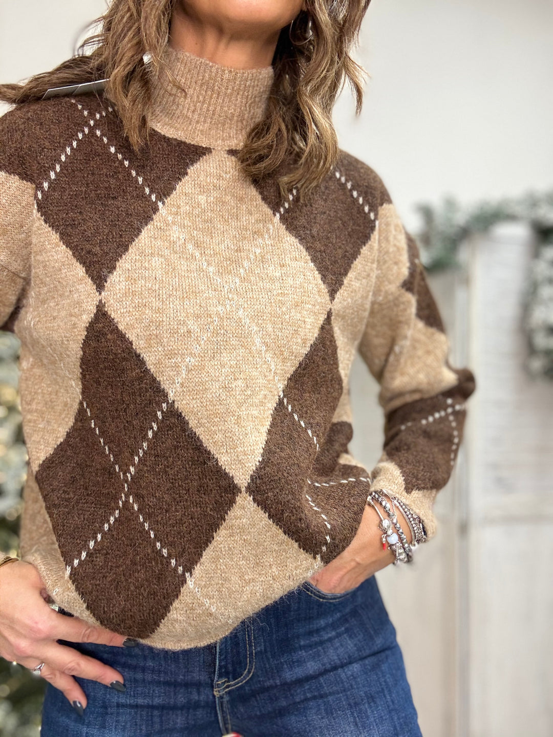 Il pull Miss con collo alto