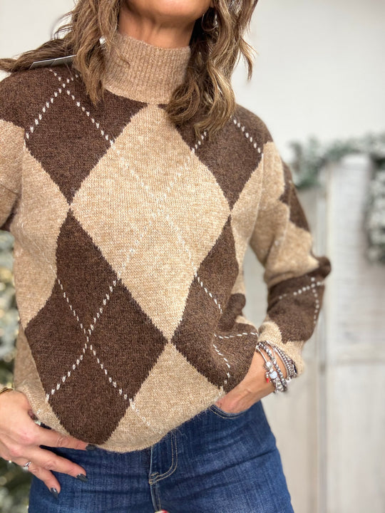 Il pull Miss con collo alto