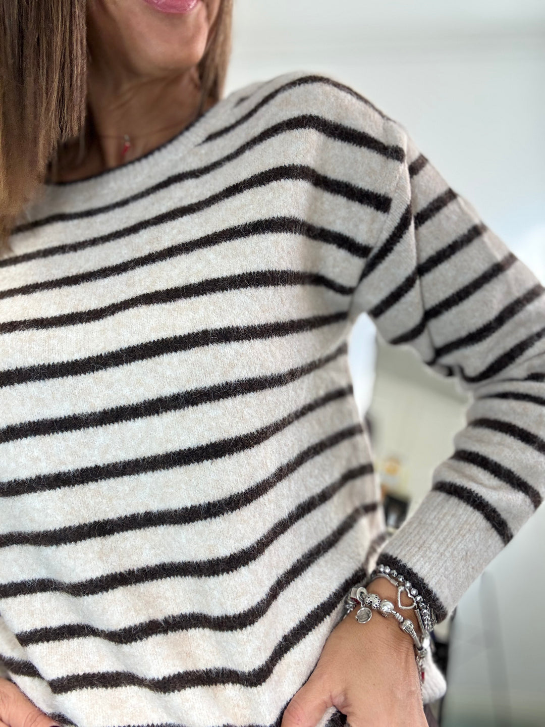Pull fiocchetti rigato