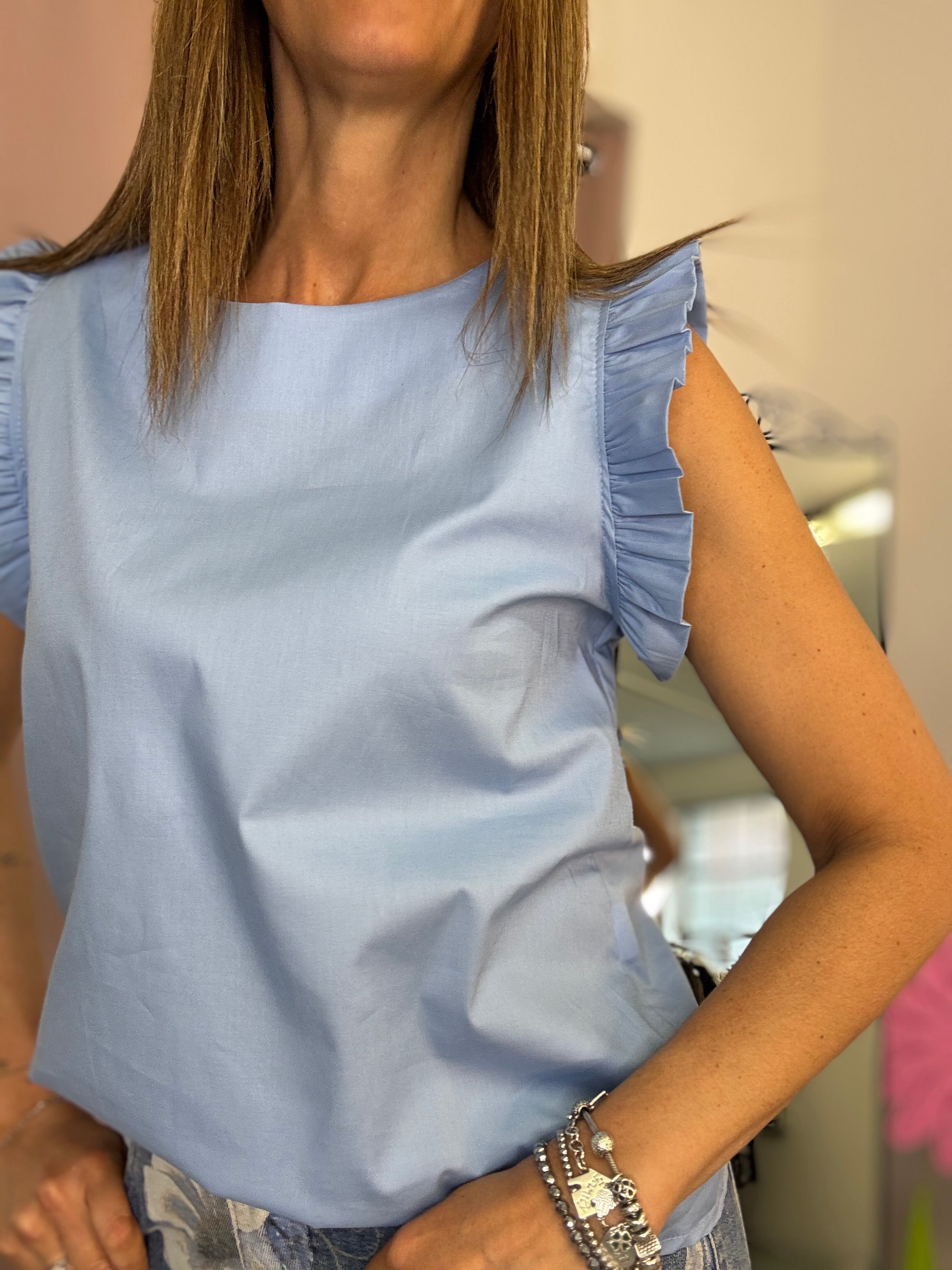 La blusa con le maniche fru fru