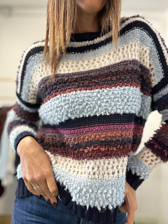Il Pull bicolore boucle