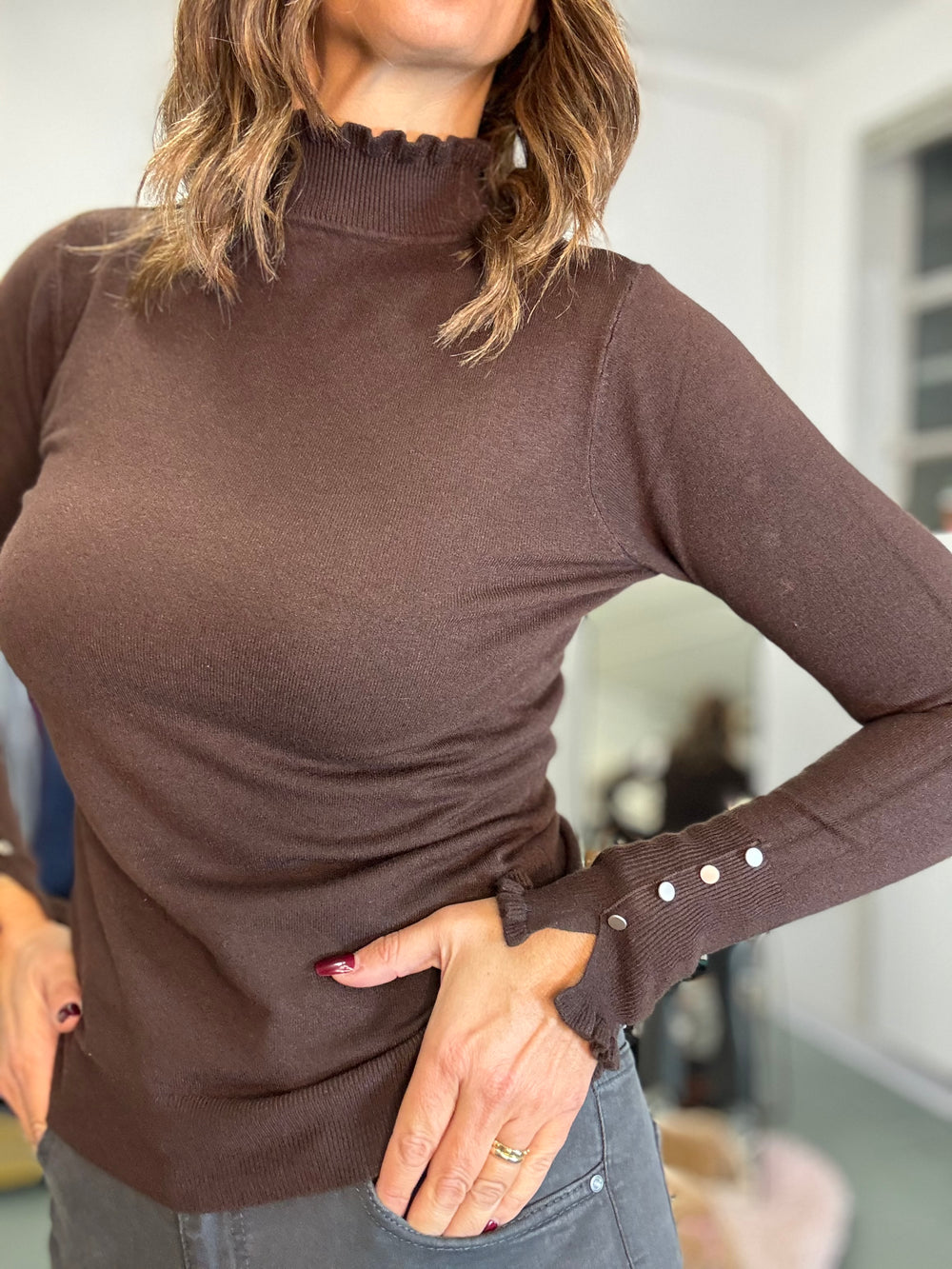 Il dolcevita fru fru coi bottoncini