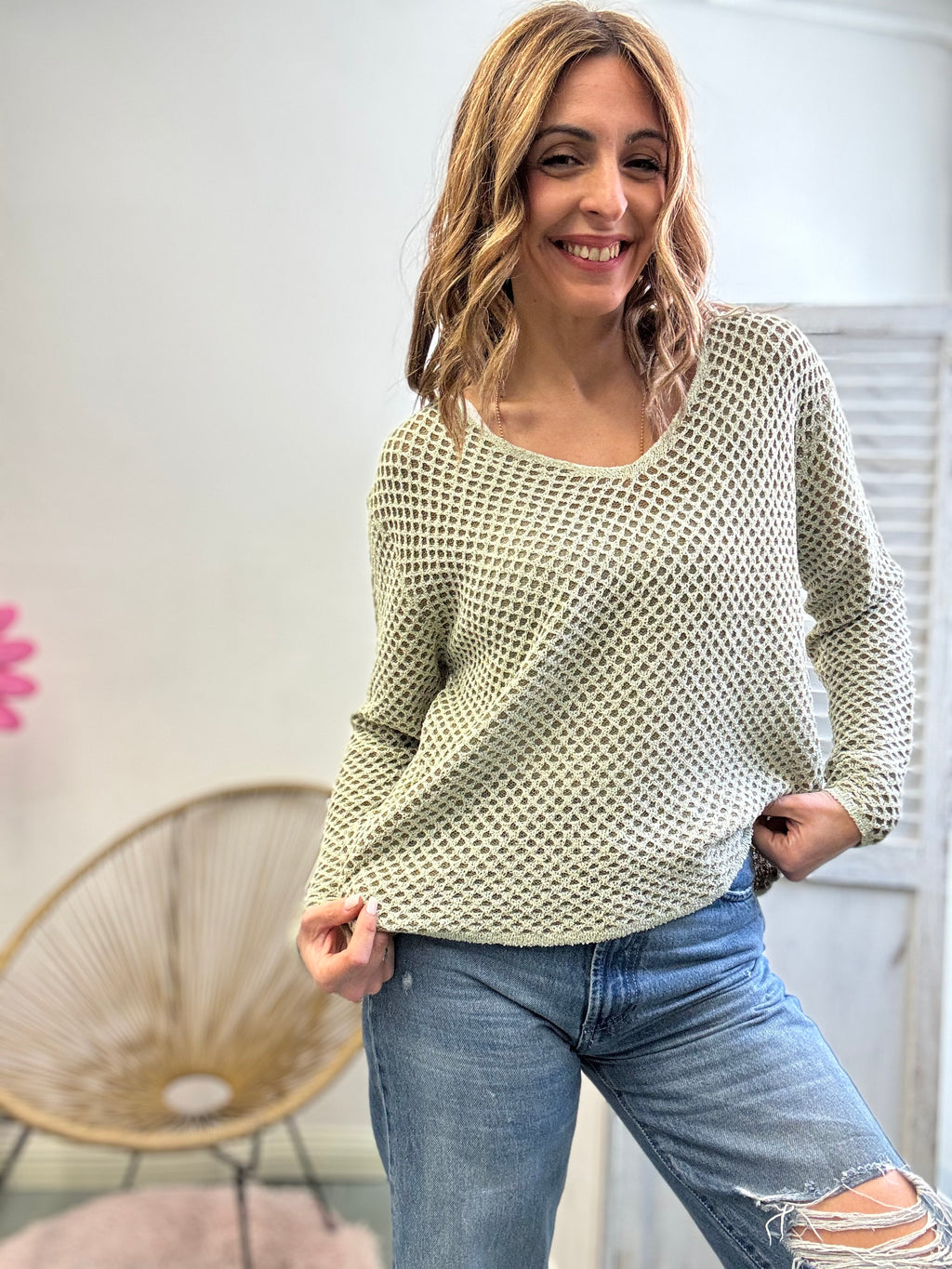 Il maglioncino a V a nido d’ape