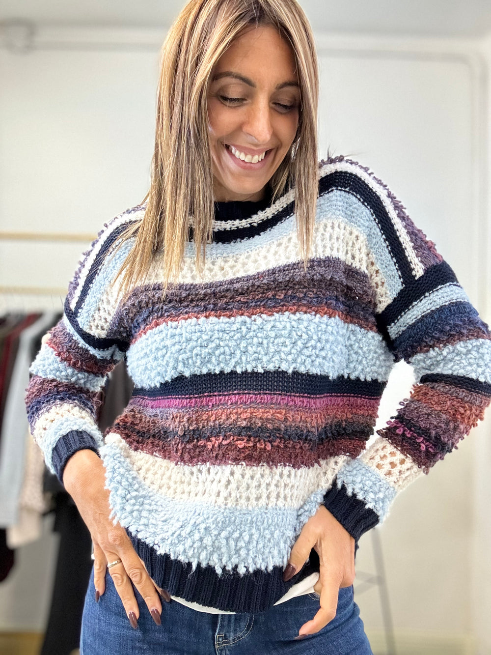 Il Pull bicolore boucle