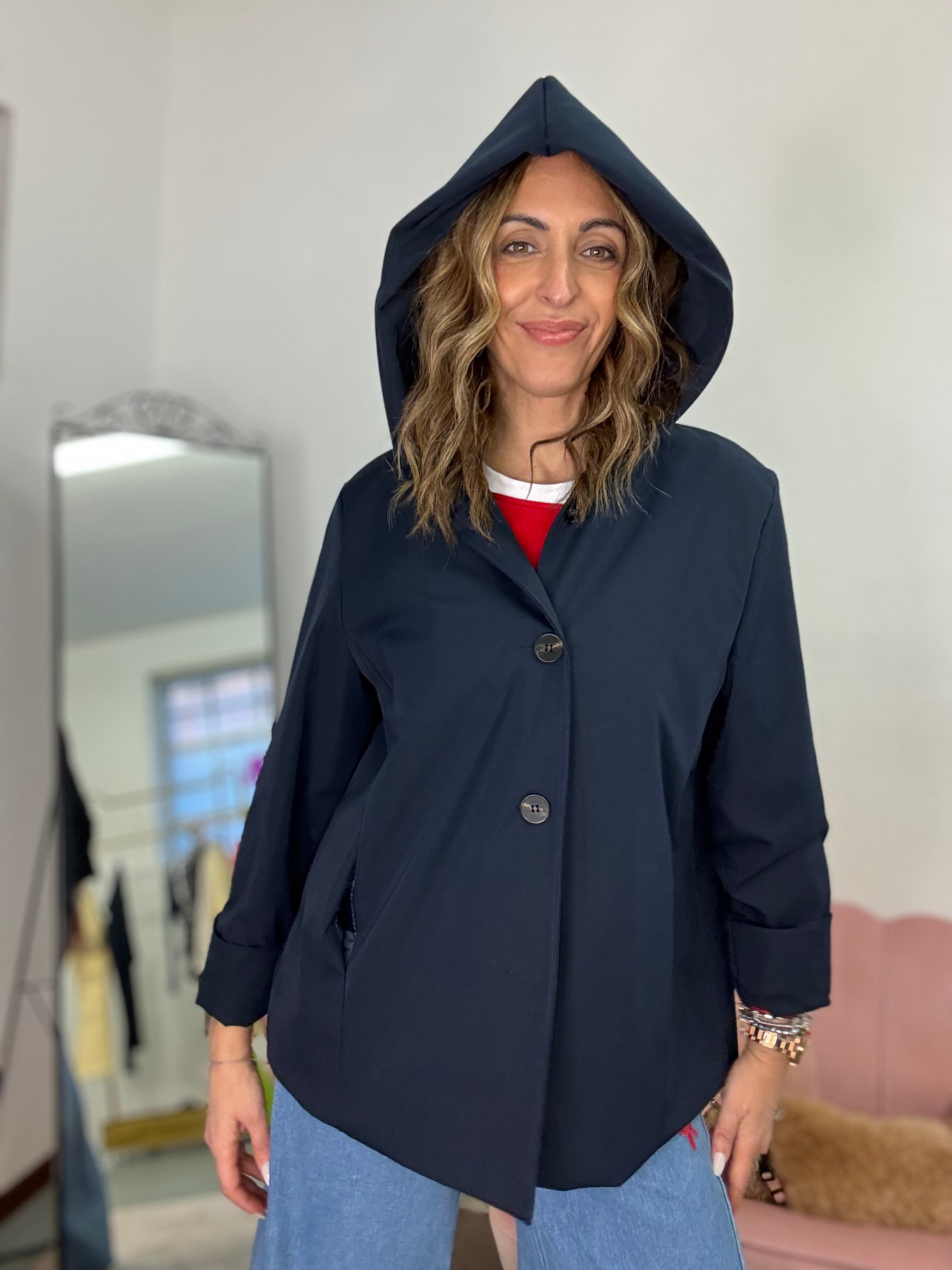 Lo spolverino col cappuccio