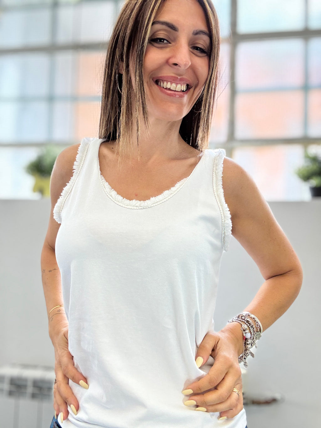 La canotta Ami con le frangette