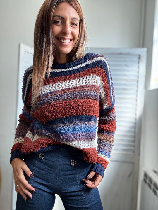 Il Pull bicolore boucle