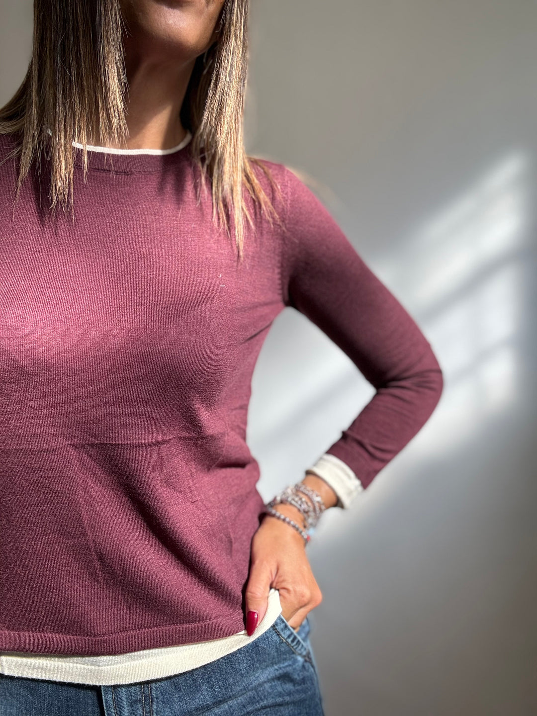 Il pull leggero sovrapposto