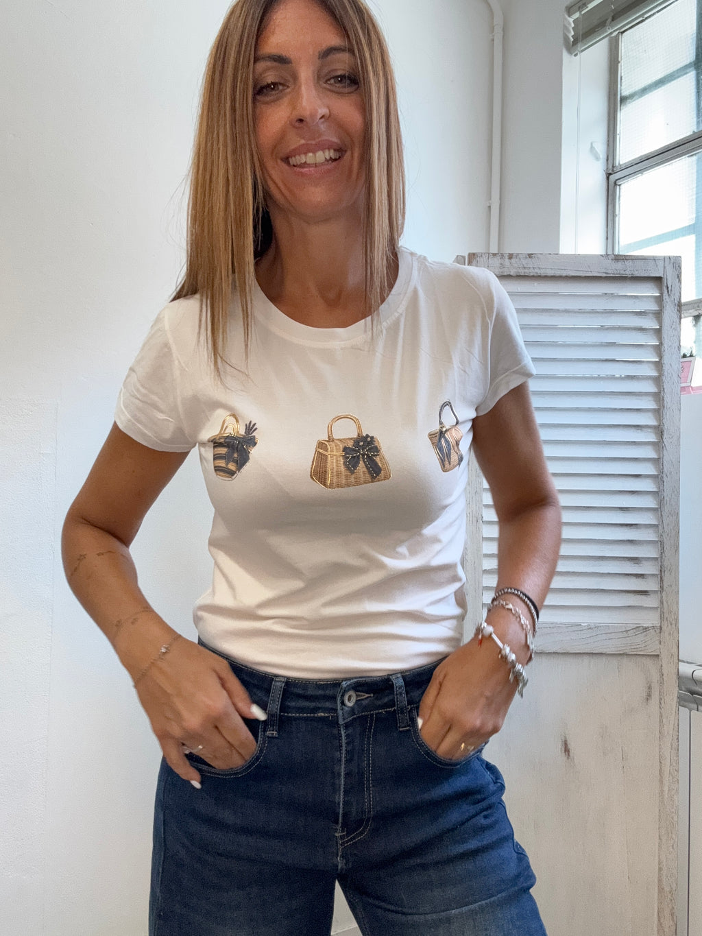 La t-shirt con le borsette