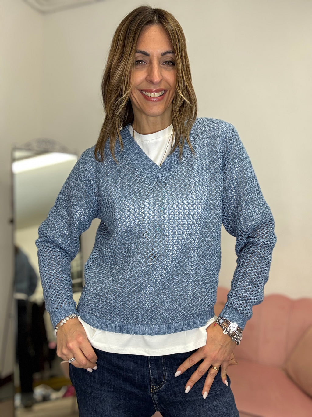 Il pull uncinetto scollo V