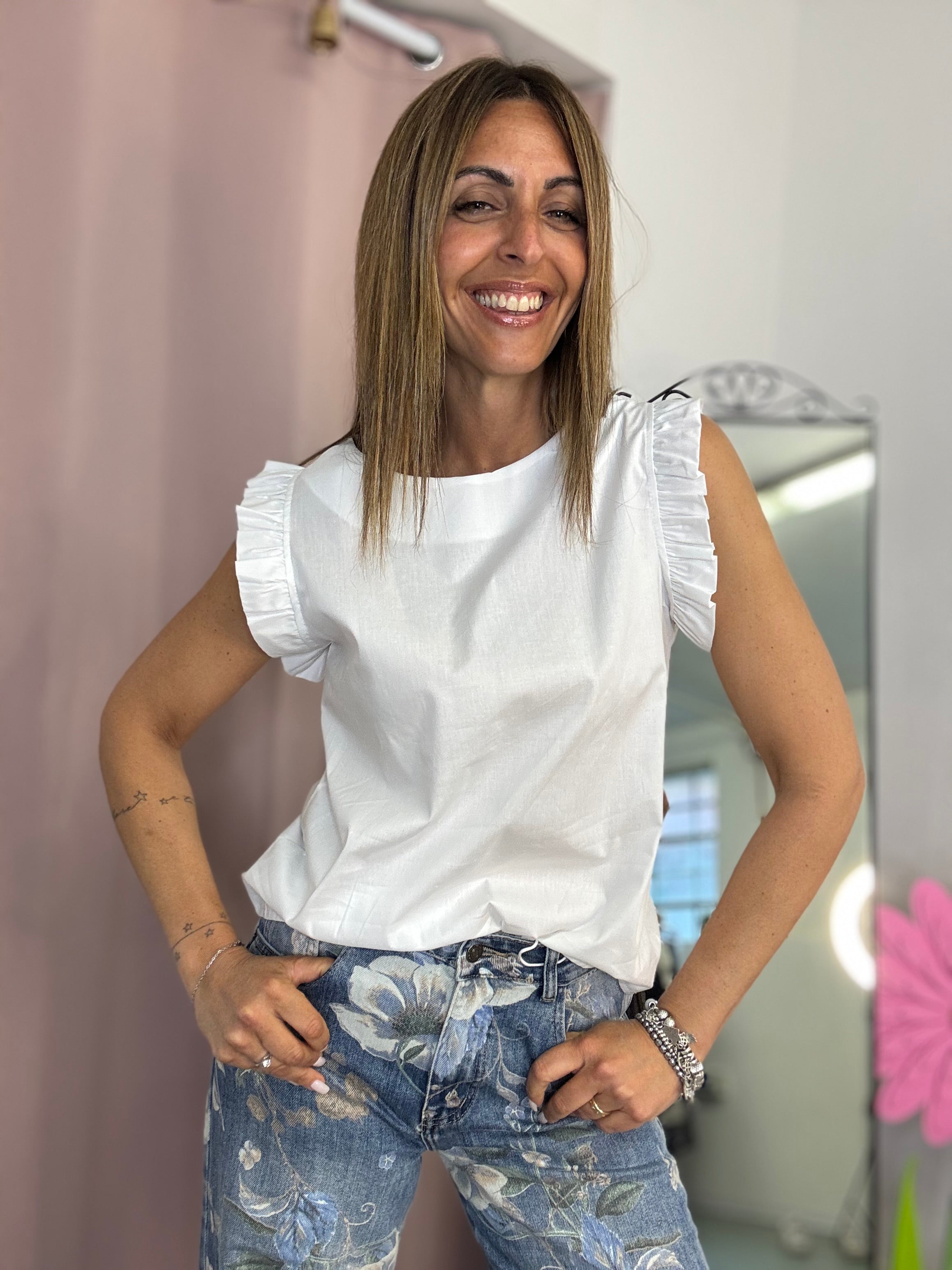 La blusa con le maniche fru fru