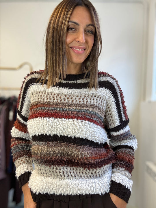 Il Pull bicolore boucle