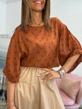 La blusa coi pois
