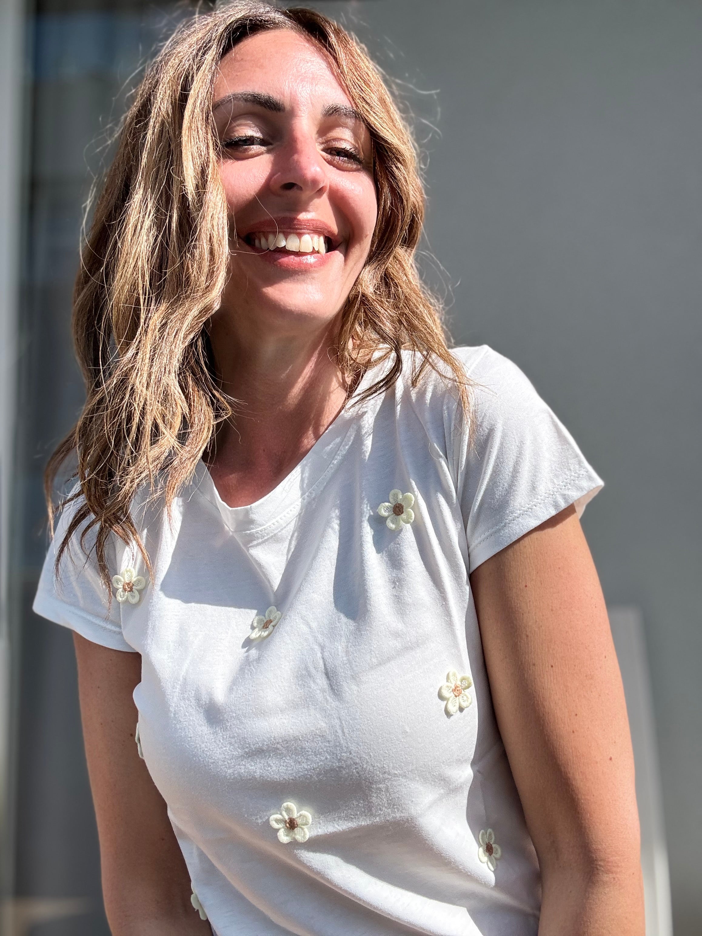 La t-shirt margheritine gialle