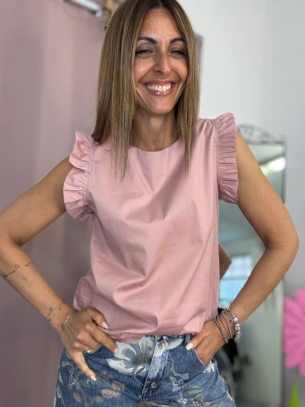 La blusa con le maniche fru fru