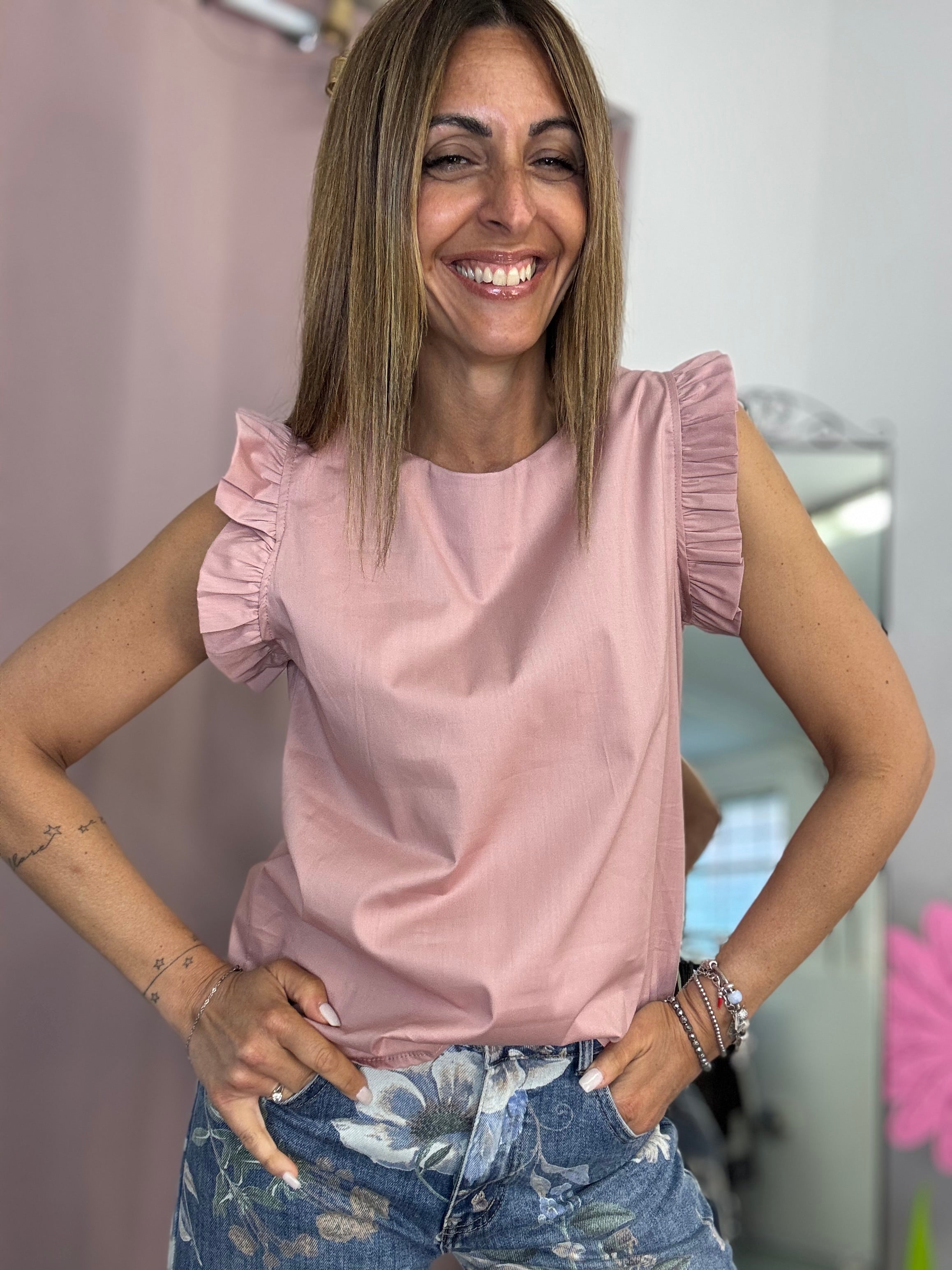 La blusa con le maniche fru fru