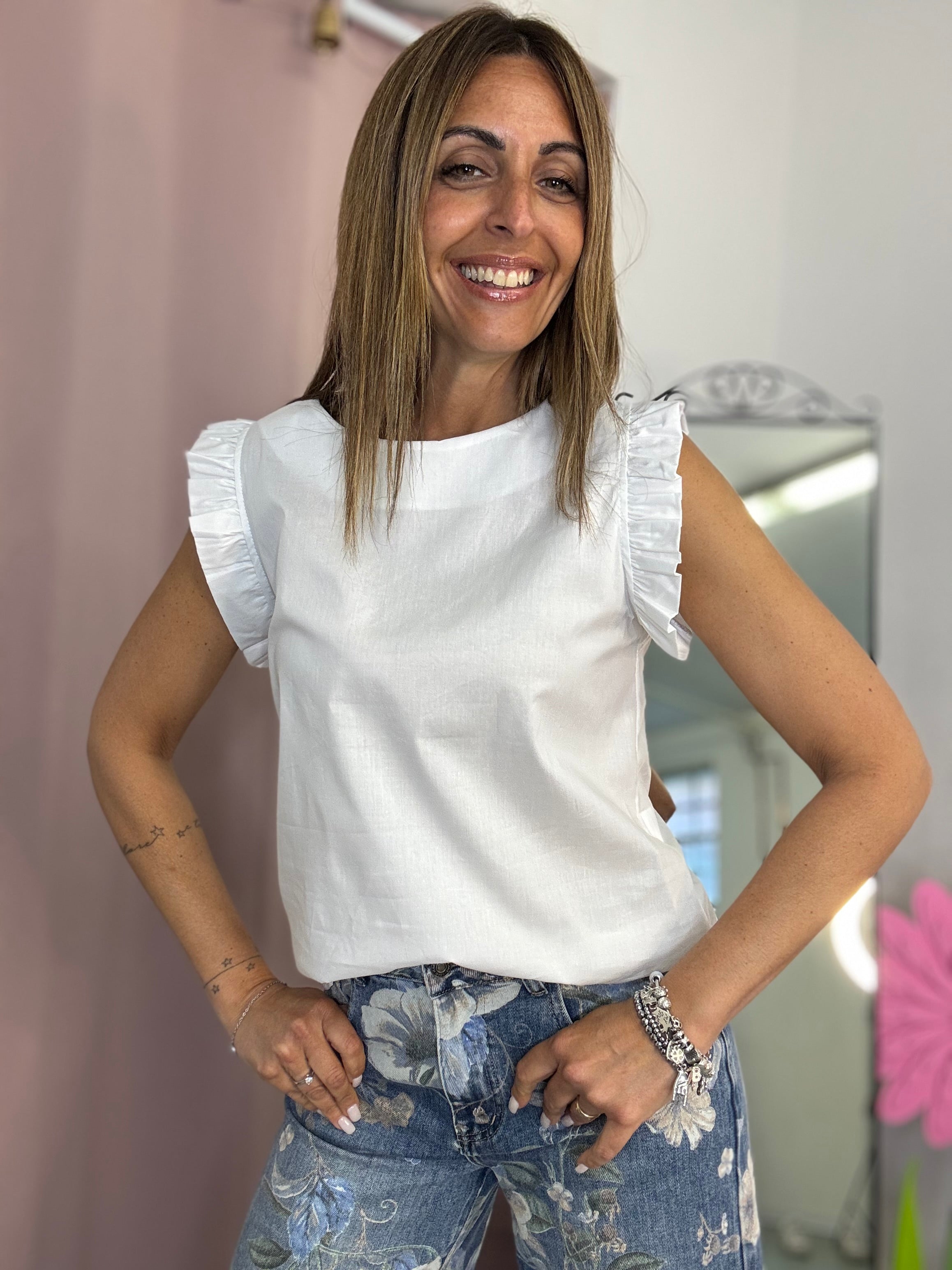 La blusa con le maniche fru fru