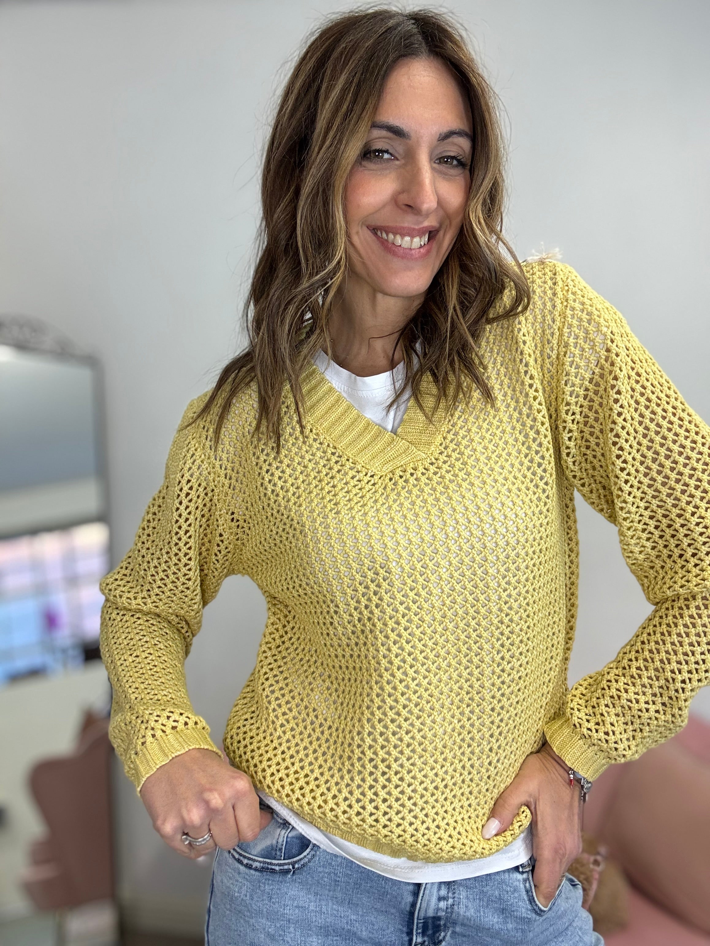 Il pull uncinetto scollo V