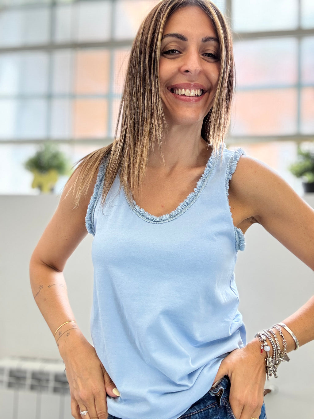 La canotta Ami con le frangette