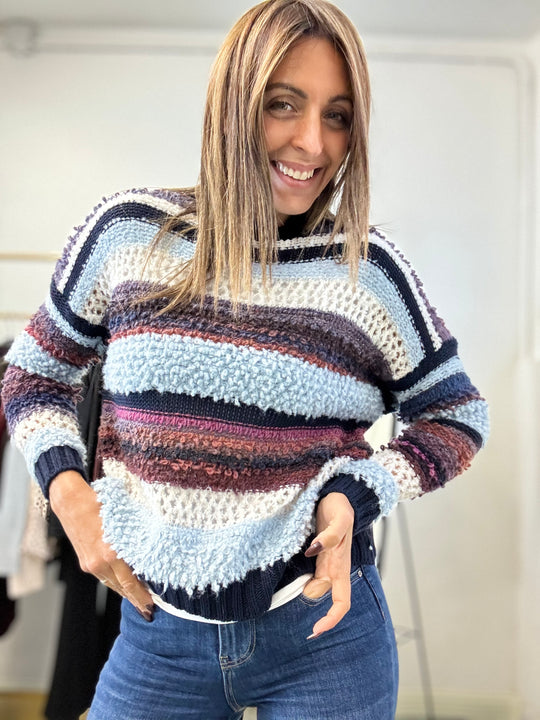 Il Pull bicolore boucle