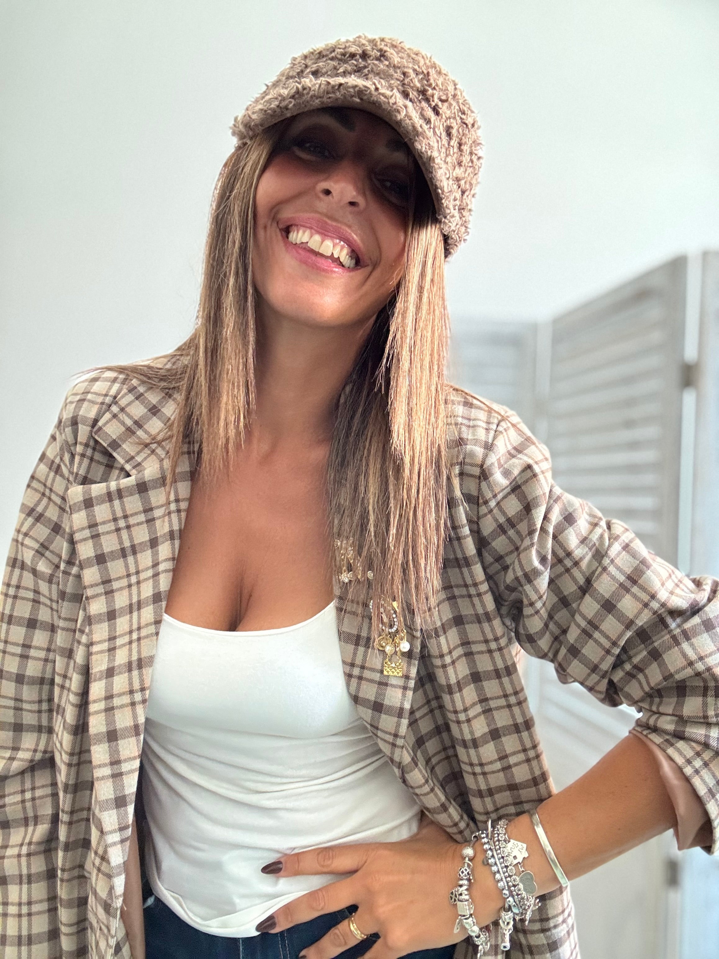 Il cappellino con la visiera boucle