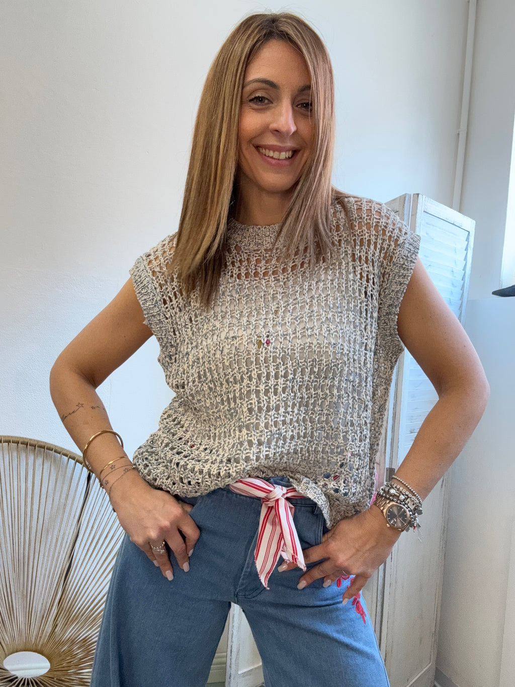 Il gilet uncinetto traforato