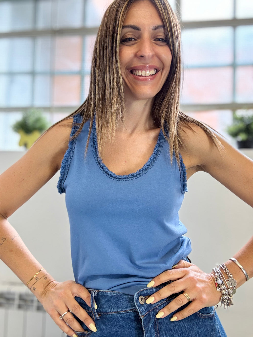 La canotta Ami con le frangette