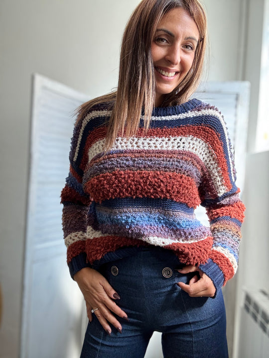 Il Pull bicolore boucle