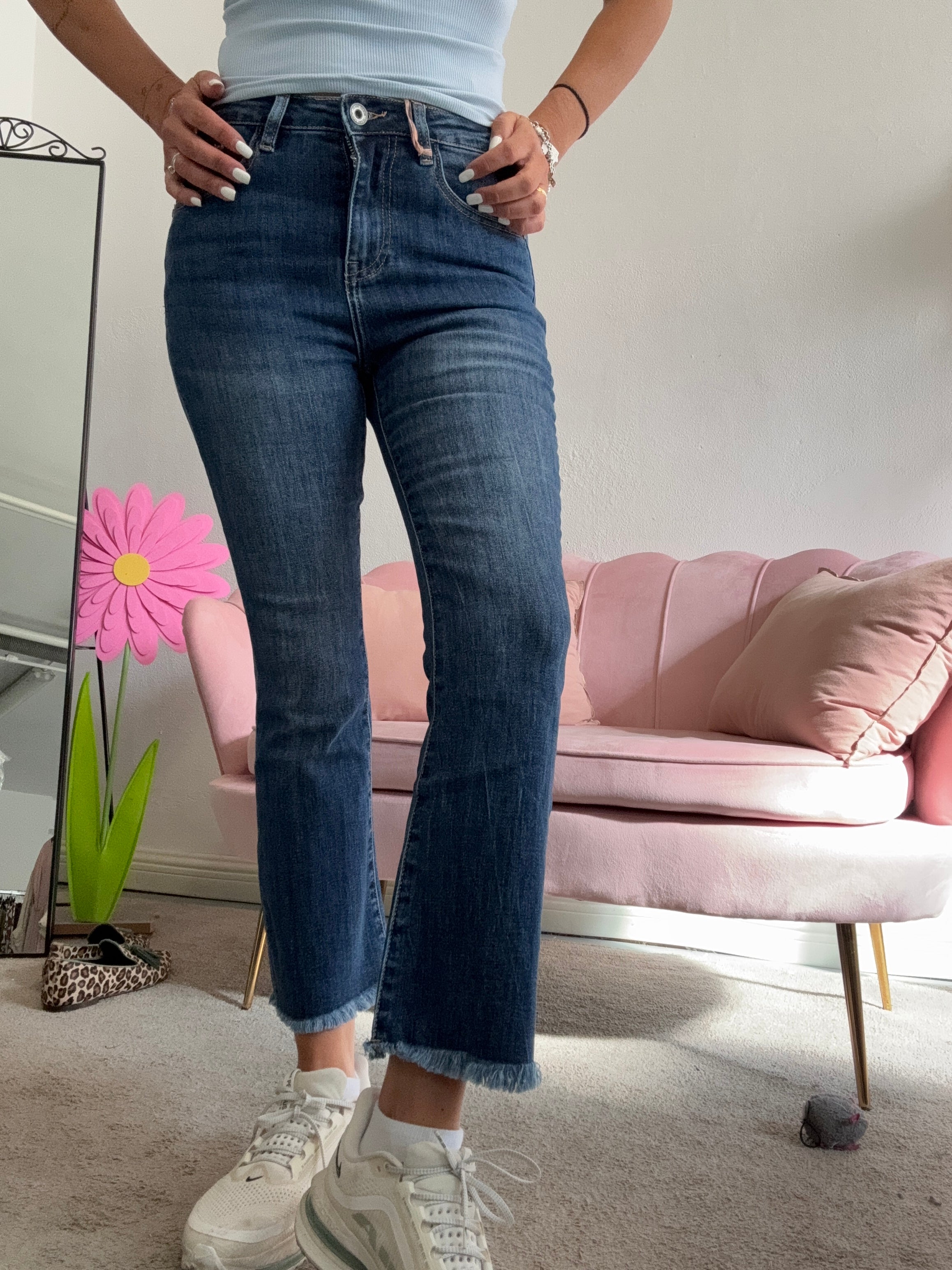 Il jeans trombetta frangette