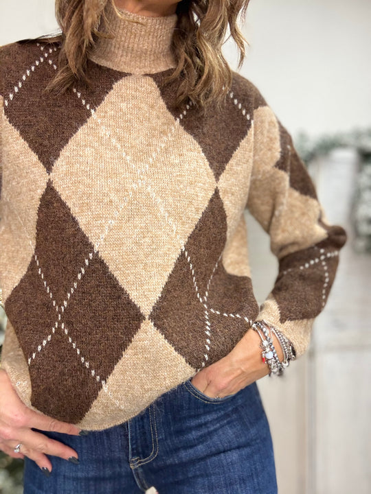 Il pull Miss con collo alto