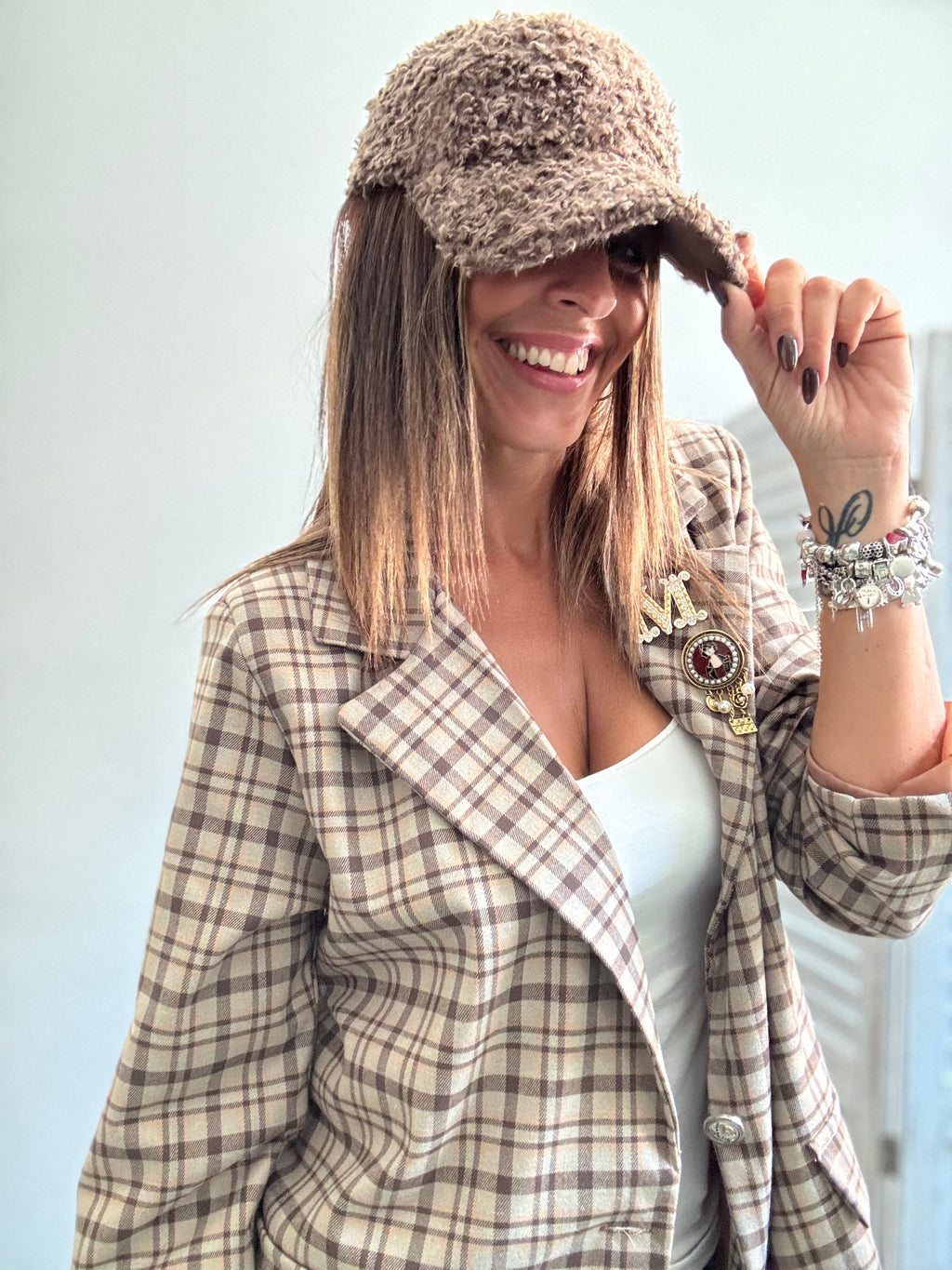 Il cappellino con la visiera boucle